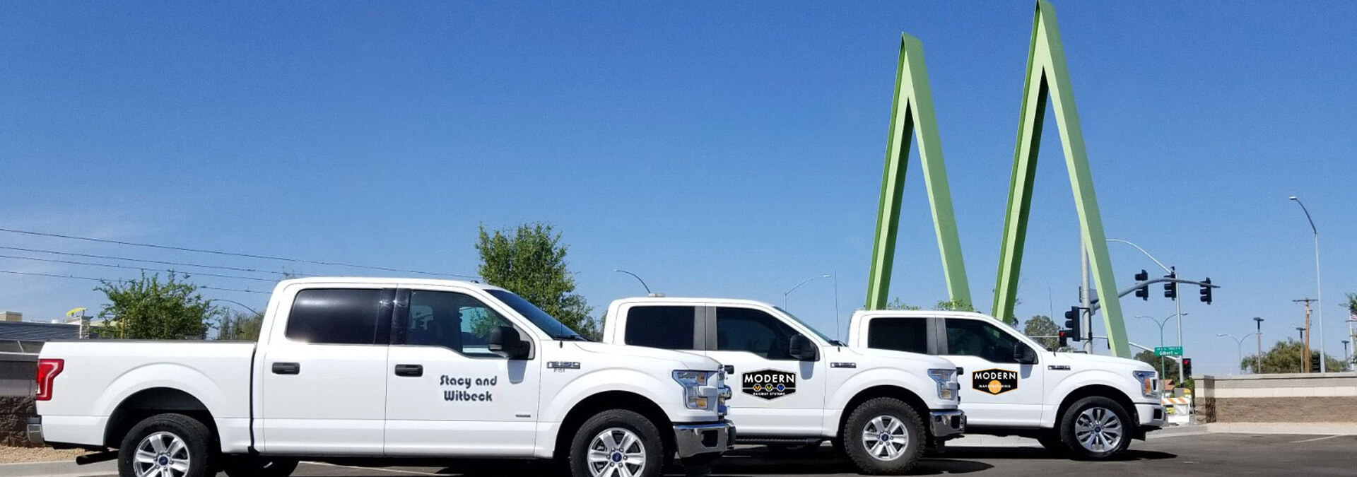 Two workers wearing safety vests.