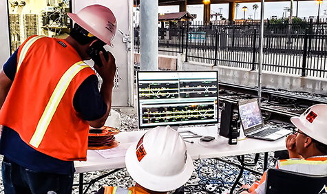 A construction site at a train crossing.