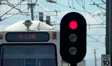 A warning light in front of an oncoming train.
