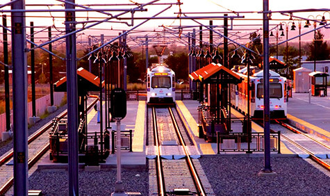 A train in a mostly empty train station.